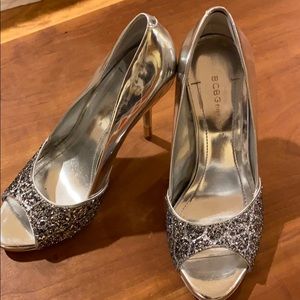 Elegant BCBG silver open toe heels.